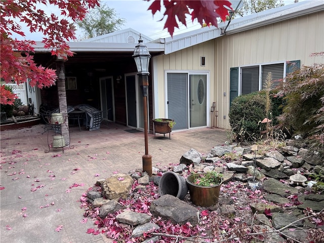 back of house with a patio area