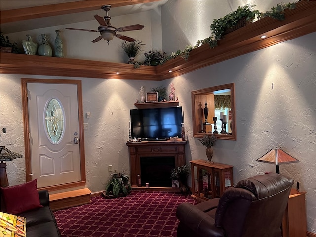 living room with ceiling fan and lofted ceiling