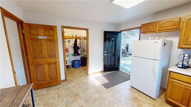 kitchen featuring white fridge