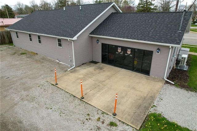 view of side of home with a garage