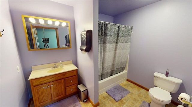 full bathroom featuring shower / tub combo, vanity, and toilet