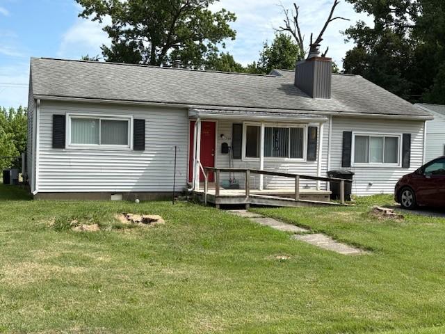 700 E Gordon Ave, Effingham, IL 62401 - ranch-style house with a chimney, a front lawn, and a shingled roof