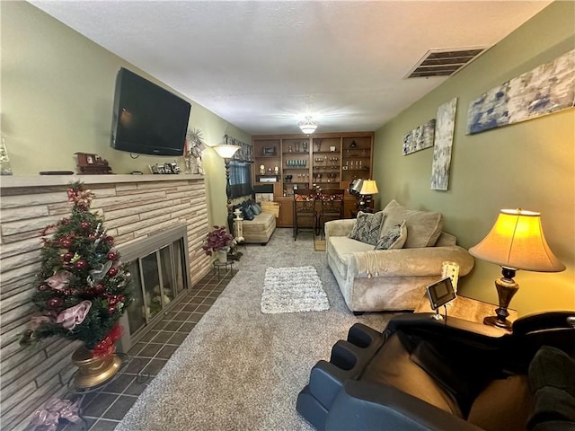 1712 Southdale Dr, Mattoon, IL 61938 - living area featuring a fireplace with flush hearth, carpet flooring, and built in features