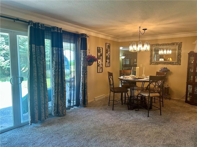 1712 Southdale Dr, Mattoon, IL 61938 - carpeted dining area with ornamental molding, a textured ceiling, and a chandelier