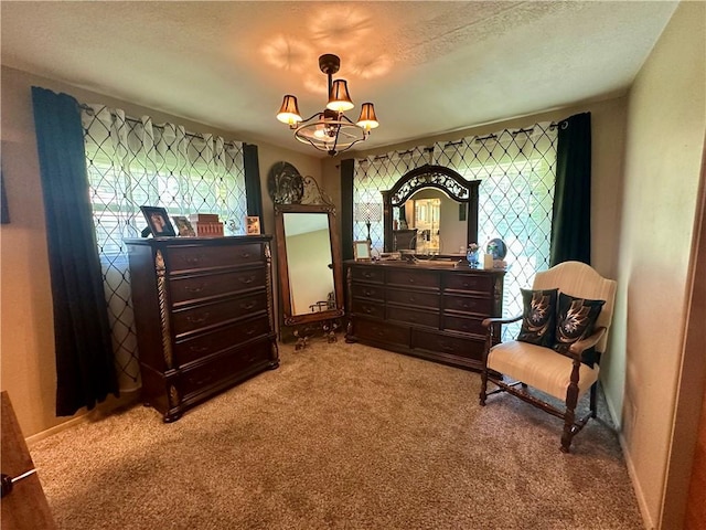 1712 Southdale Dr, Mattoon, IL 61938 - bedroom with light carpet, a chandelier, multiple windows, and a textured ceiling