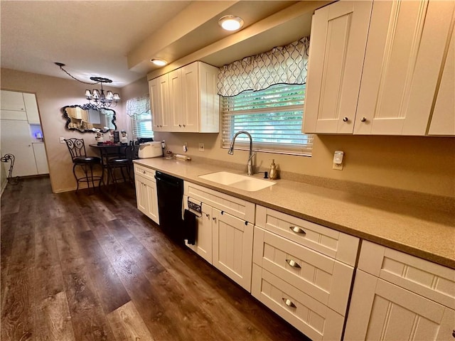 1712 Southdale Dr, Mattoon, IL 61938 - kitchen with black dishwasher, white cabinetry, light countertops, and dark wood-type flooring