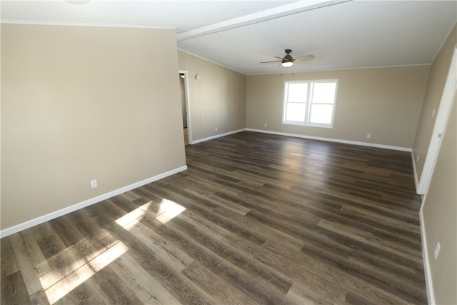 spare room with ceiling fan, dark hardwood / wood-style flooring, and crown molding