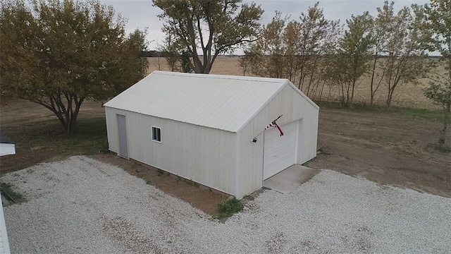 view of outbuilding with a garage