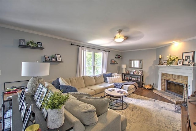 1077 Cornell Dr, Decatur, IL 62522 - living area featuring wood finished floors, crown molding, a ceiling fan, and a fireplace