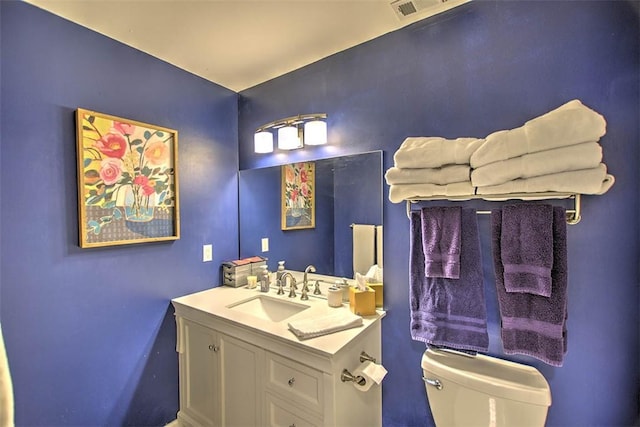 1077 Cornell Dr, Decatur, IL 62522 - half bath featuring toilet and vanity