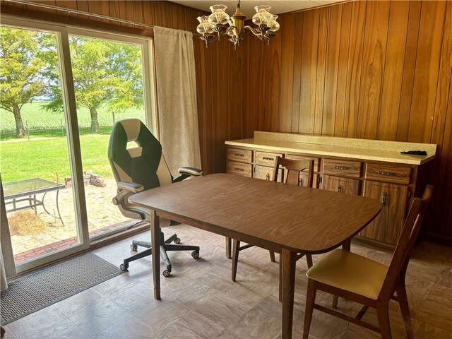 2496 N 300th St, Mason, IL 62443 - dining area with wooden walls and a chandelier