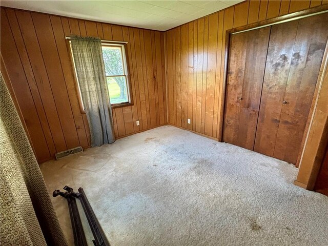 2496 N 300th St, Mason, IL 62443 - unfurnished bedroom with carpet floors and wood walls