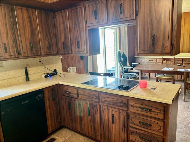 2496 N 300th St, Mason, IL 62443 - kitchen with black appliances, light countertops, and a peninsula