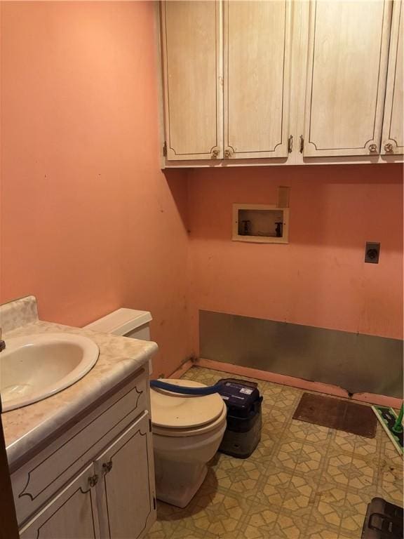 2496 N 300th St, Mason, IL 62443 - half bathroom with vanity and tile patterned floors
