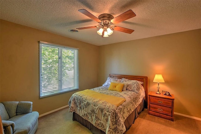 95 Hickory Point Ct, Forsyth, IL 62535 - bedroom with light colored carpet, a ceiling fan, and a textured ceiling