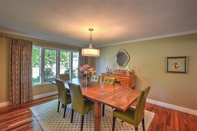 95 Hickory Point Ct, Forsyth, IL 62535 - dining area with crown molding, wood finished floors, and a textured ceiling