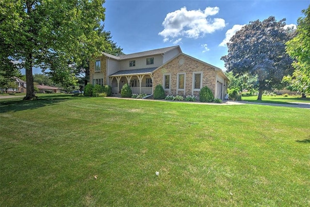 95 Hickory Point Ct, Forsyth, IL 62535 - view of front of home with an attached garage, a front lawn, driveway, and a porch