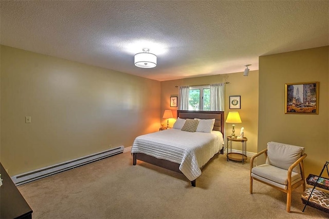 95 Hickory Point Ct, Forsyth, IL 62535 - carpeted bedroom with a baseboard heating unit and a textured ceiling