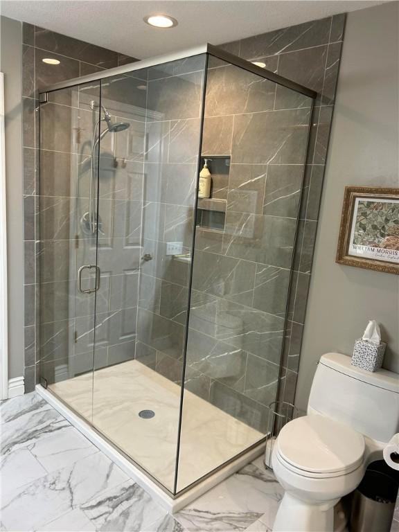 95 Hickory Point Ct, Forsyth, IL 62535 - bathroom with marble look tiles, a stall shower, and recessed lighting