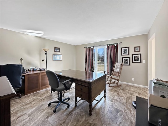 office space featuring baseboards