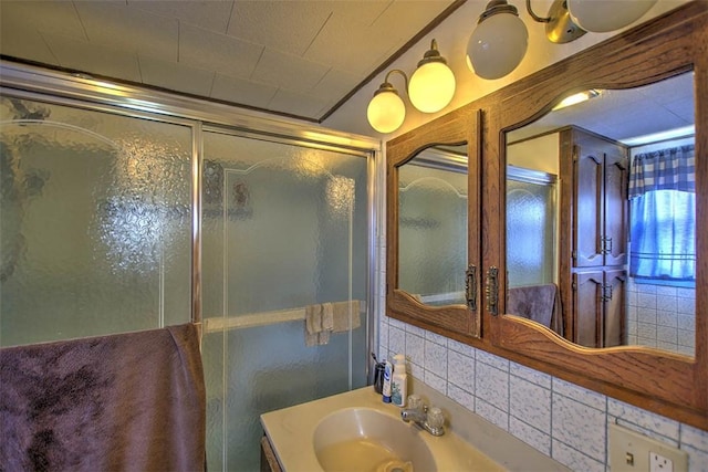 1212 Washington St, Clinton, IL 61727 - bathroom with an enclosed shower and vanity