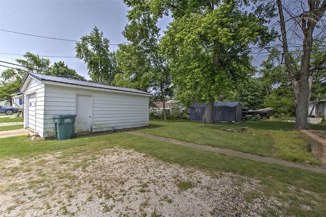 1212 Washington St, Clinton, IL 61727 - view of green lawn with an outdoor structure