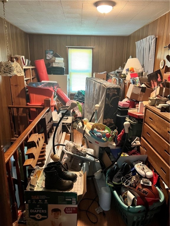 miscellaneous room with wooden walls