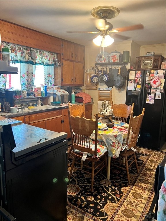 dining room featuring ceiling fan