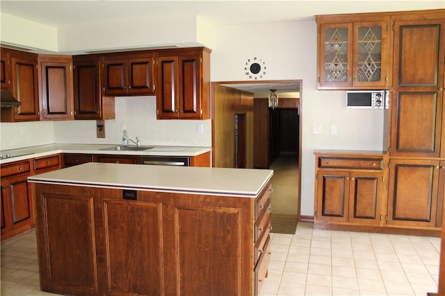 1011 W N 3rd St, Shelbyville, IL 62565 - kitchen with a sink, light countertops, a kitchen island, and light tile patterned floors