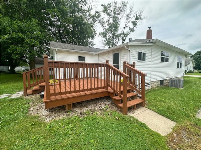 126 E Elliott St, Paris, IL 61944 - back of house with a chimney, a lawn, a deck, and roof with shingles