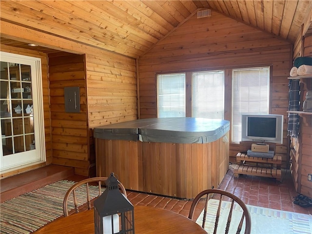 303 S Pine St, Pana, IL 62557 - dining room with vaulted ceiling, wooden walls, electric panel, and wood ceiling
