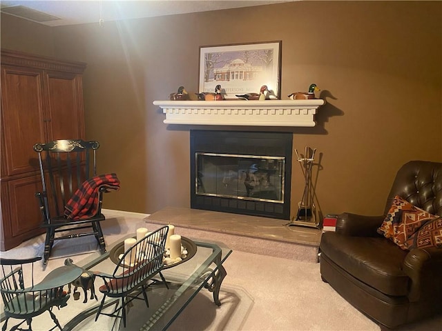303 S Pine St, Pana, IL 62557 - carpeted living area with a glass covered fireplace