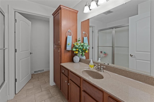 309 Santa Barbara Dr, Effingham, IL 62401 - bathroom with vanity, an enclosed shower, and tile patterned flooring