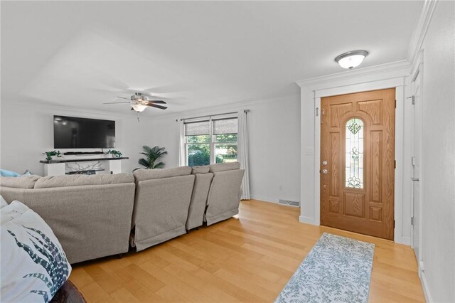 309 Santa Barbara Dr, Effingham, IL 62401 - living area featuring light wood-type flooring, crown molding, and a ceiling fan