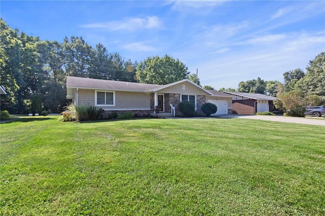 309 Santa Barbara Dr, Effingham, IL 62401 - single story home with concrete driveway, a garage, a front lawn, and stone siding