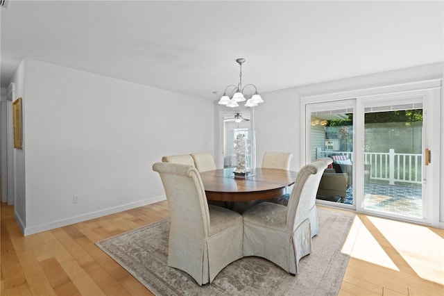 309 Santa Barbara Dr, Effingham, IL 62401 - dining area with a chandelier and light wood-type flooring