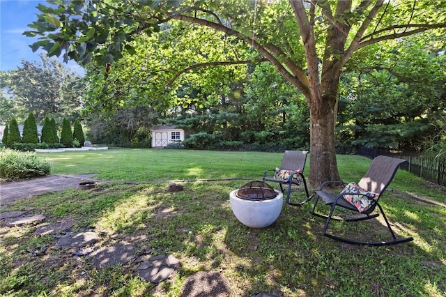 309 Santa Barbara Dr, Effingham, IL 62401 - view of yard featuring a fire pit and a shed