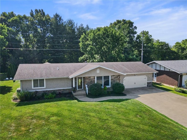 309 Santa Barbara Dr, Effingham, IL 62401 - ranch-style house featuring stone siding, an attached garage, concrete driveway, and a front yard