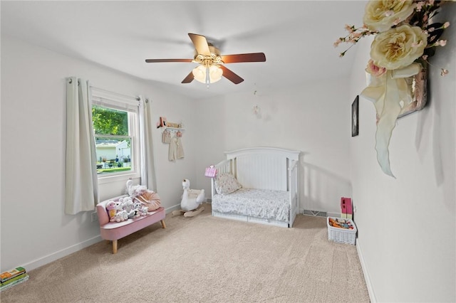 309 Santa Barbara Dr, Effingham, IL 62401 - carpeted bedroom with a crib and a ceiling fan