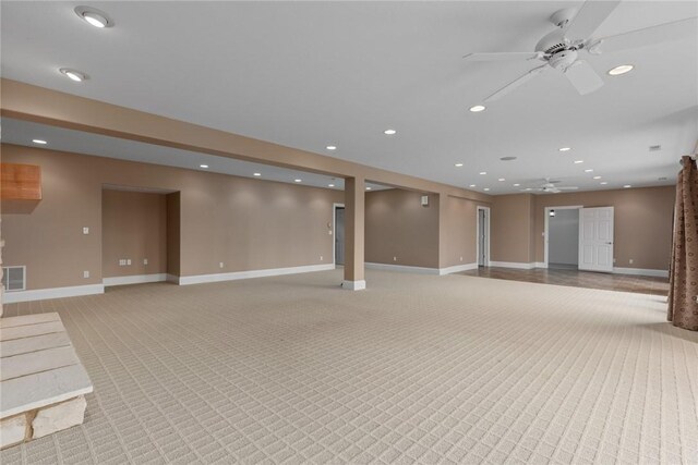 17212 Stonecreek Dr, Effingham, IL 62401 - basement with ceiling fan, light colored carpet, baseboards, and recessed lighting