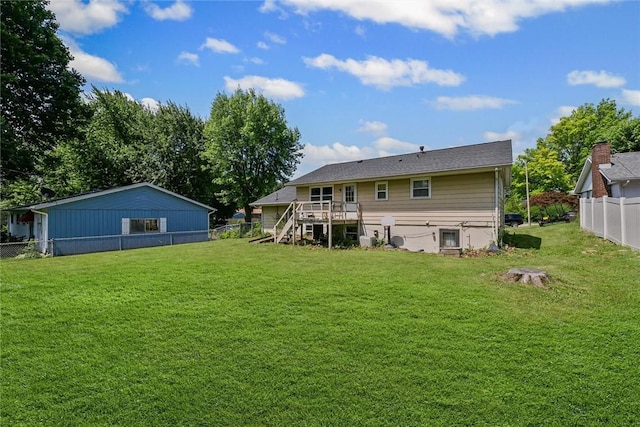 2701 E Rd, Danville, IL 61832 - rear view of property featuring a fenced backyard, stairs, and a wooden deck