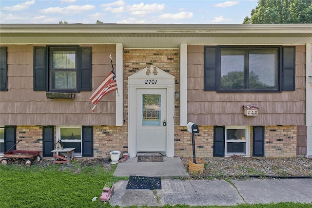 2701 E Rd, Danville, IL 61832 - doorway to property featuring brick siding