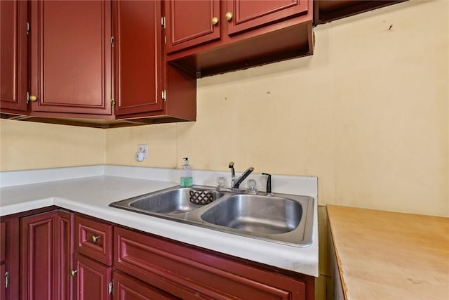 2701 E Rd, Danville, IL 61832 - kitchen with light countertops and reddish brown cabinets