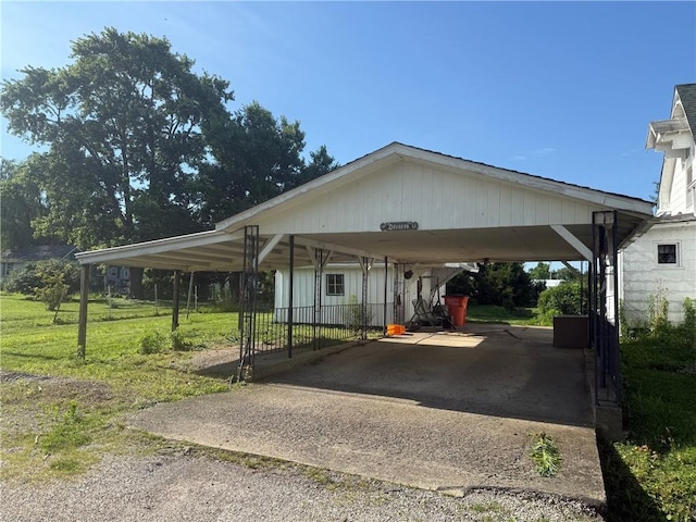 208 N Charles St, Beecher City, IL 62414 - view of parking with a carport and driveway