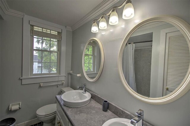 2064 William St, Decatur, IL 62522 - full bath featuring double vanity, toilet, ornamental molding, baseboards, and a shower with shower curtain