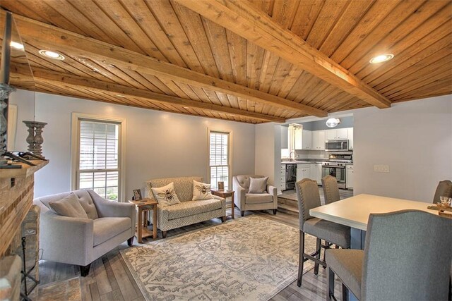 2064 William St, Decatur, IL 62522 - living area featuring wooden ceiling with exposed beams, wood finished floors, recessed lighting, and wine cooler