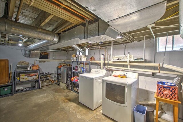 2064 William St, Decatur, IL 62522 - below grade area with washing machine and clothes dryer and water heater