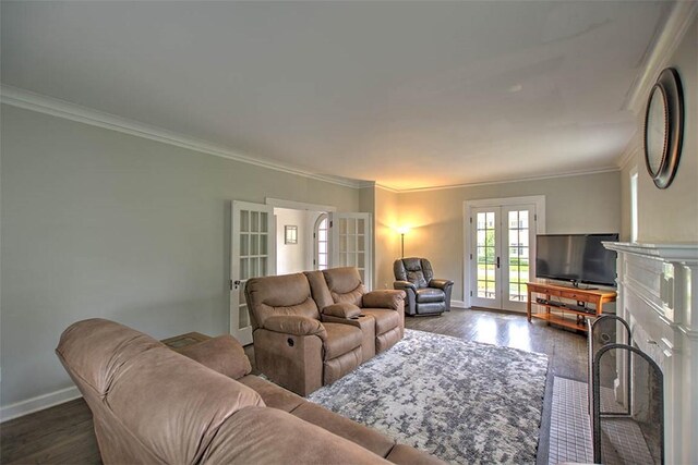 2064 William St, Decatur, IL 62522 - living room featuring french doors, baseboards, crown molding, and dark wood-style floors