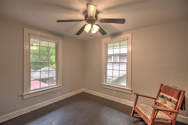 2064 William St, Decatur, IL 62522 - unfurnished room featuring healthy amount of natural light, baseboards, and dark wood-style floors