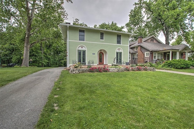 2064 William St, Decatur, IL 62522 - view of front of house featuring a front lawn and stucco siding